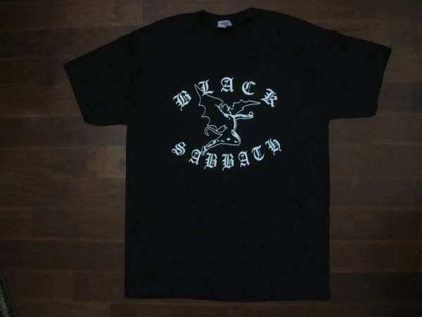 Black Sabbath- Flying Demon Between Arched Old English Logo- T-Shirt - Two Sided Print